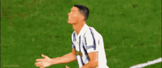 a soccer player wearing a jersey that says ' juventus ' on the front