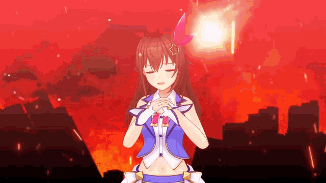 a girl in a blue and white outfit is standing in front of a fire .
