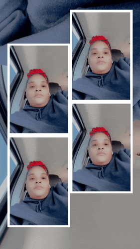 a woman with red hair is sitting in the back seat of a vehicle