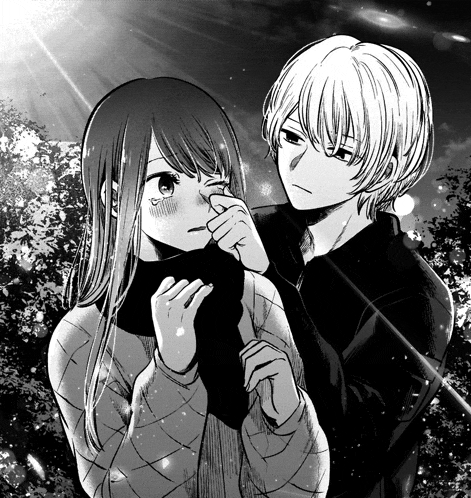 a boy and a girl are standing next to each other