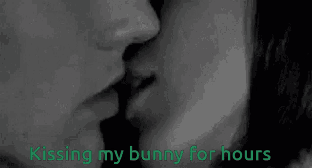 a man and a woman kissing with the words kissing my bunny for hours below them