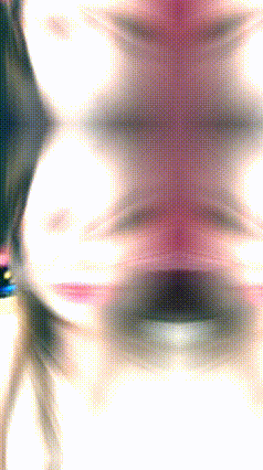 a blurry picture of a woman 's face with a red stripe on the bottom