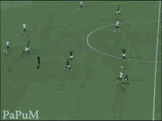a group of soccer players are playing on a field with the words papum written on the bottom