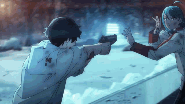 a man is pointing a gun at another man who is holding a gun