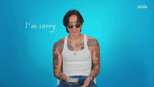 a man in a white tank top says i 'm sorry to your ovaries sincerely christian yu