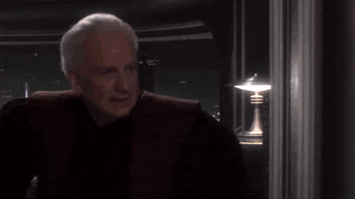 a glowing light is coming out of a dark room