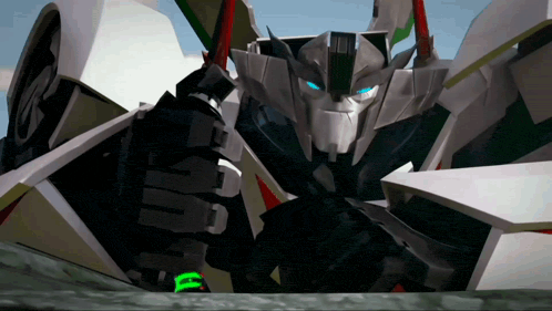 a robot with blue eyes and a green stripe on its arm