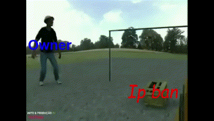 a man is standing in a park with the words owner and ip ban written on the screen