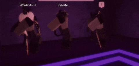 a group of people are standing in a dark room and one of them is named selvaoscuro