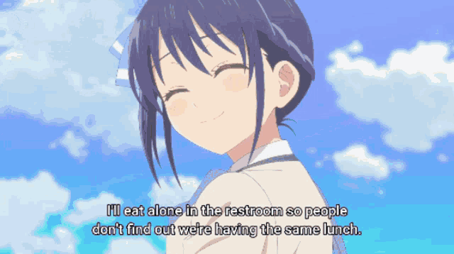 a girl is smiling and talking about eating alone