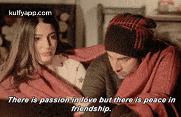a man and a woman wrapped in a blanket with a quote that says there is passion in love but there is peace in friendship