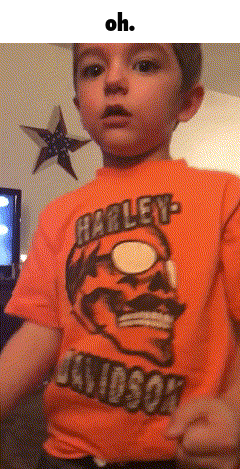 a boy wearing an orange harley davidson shirt