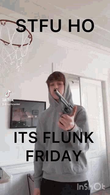 a man in a hoodie is holding a gun in front of a basketball hoop that says stfu ho its flunk friday
