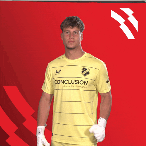 a young man wearing a yellow shirt that says conclusion