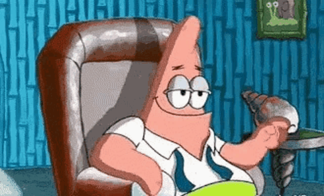 patrick star is sitting in a chair holding a seashell .