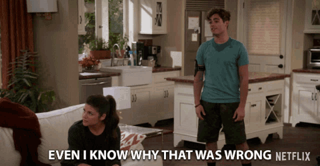 a man and woman in a living room with the words even i know why that was wrong netflix at the bottom