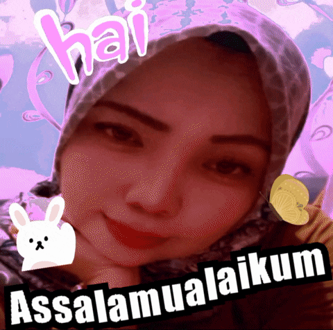 a woman wearing a hijab with the words hai assalamualaikum written on it