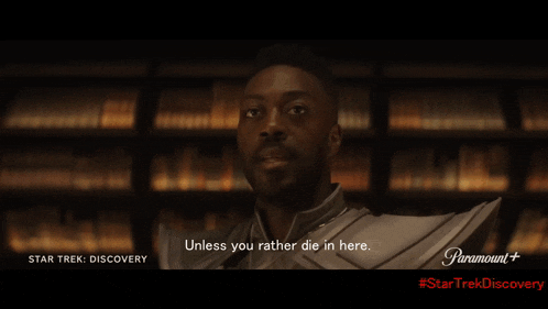 a star trek discovery advertisement with a woman smiling in a library
