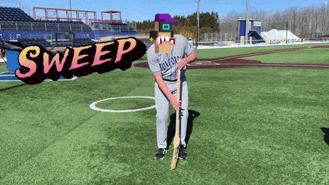 a baseball player is holding a bat with a sweep sign behind him