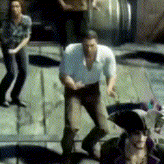 a man in a white shirt is standing in a crowd