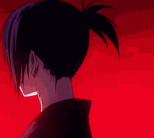 a close up of a person 's head with a red background