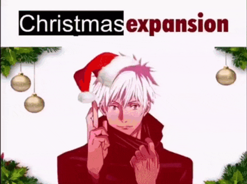 a man wearing a santa hat is standing in front of a christmas decoration .