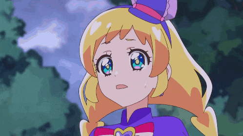 a girl with blonde hair and blue eyes wearing a purple top hat