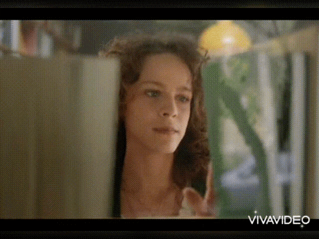 a close up of a woman 's face with the words vivavideo in the corner .
