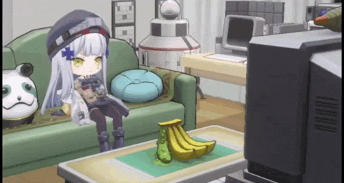 a little girl is sitting on a couch in a living room with a banana on the table .