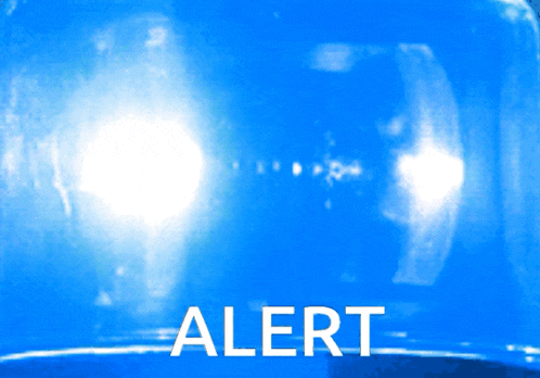 a blue light with the word alert in white letters