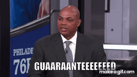 a man in a suit and tie is saying guaaranteeeed