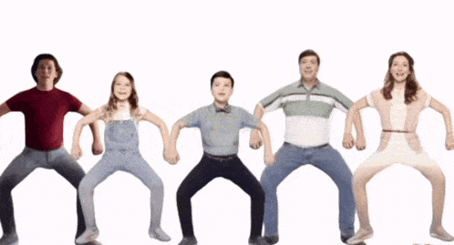 a group of people are dancing in a line