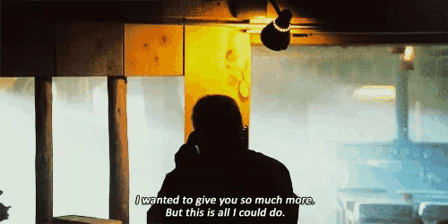 a man talking on a cell phone with the words i wanted to give you so much more but this is all i could do below him