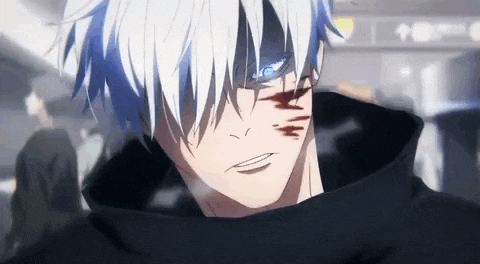 a close up of a person with white hair and a black hoodie .