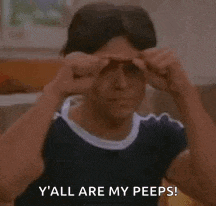 a man is holding his hands to his forehead and saying `` y 'all are my peeps ! ''
