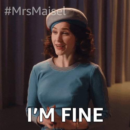 a woman in a blue dress says i 'm fine with her hands outstretched