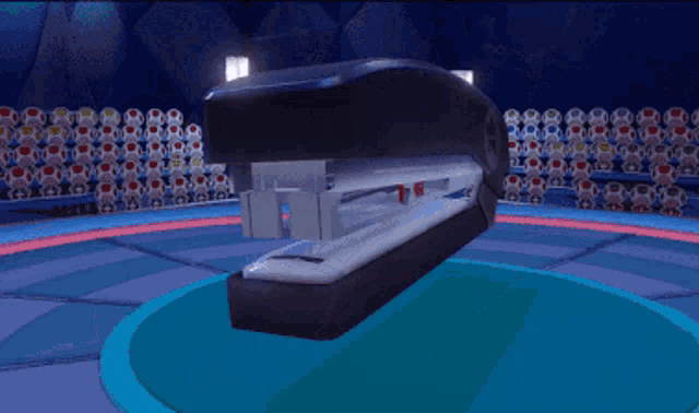 a stapler is sitting on a blue table in front of a crowd of mushrooms