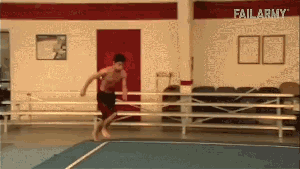 a man is doing a trick on a trampoline in front of a sign that says failarmy