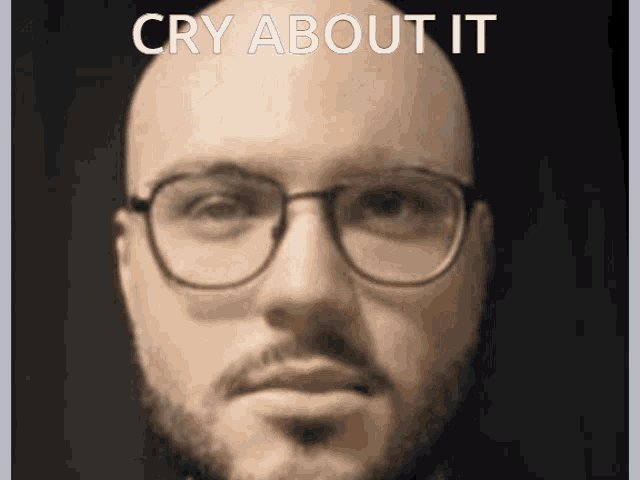 a close up of a man 's face with the words cry about it above it