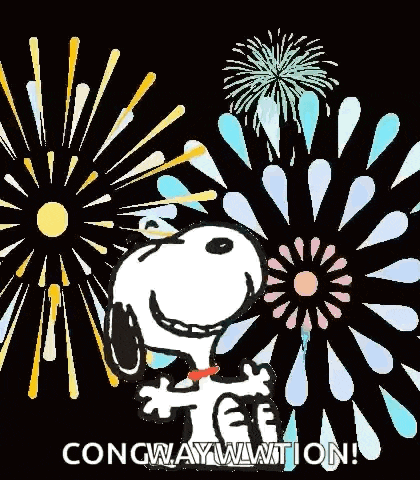 snoopy is standing in front of a fireworks display with the words `` congratulations ! ''