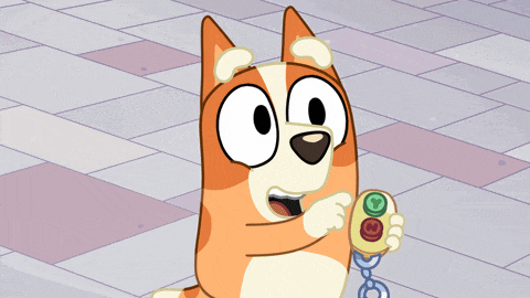 a cartoon dog is holding a remote control in its paw