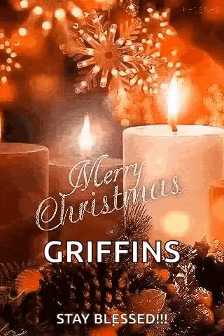 a merry christmas greeting card with two lit candles , pine cones , and a snowflake .