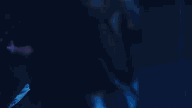 a blurry picture of a person playing a drum set
