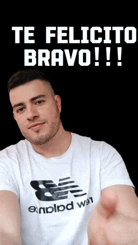a man wearing a white shirt that says new balance on it