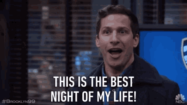 a man says this is the best night of my life in front of a police badge