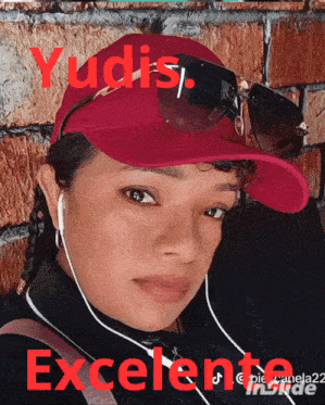 a woman wearing a red hat and sunglasses with the word yudis written on it