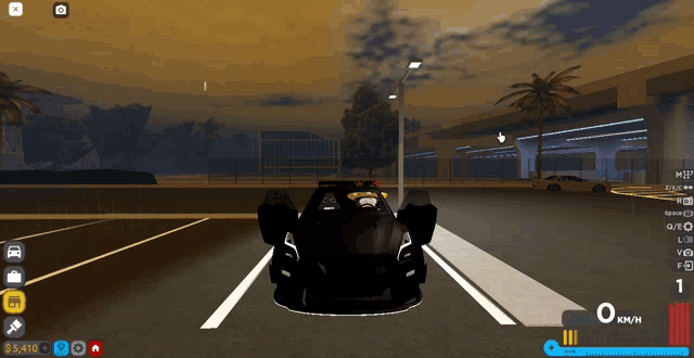 a black car is parked in a parking lot with a screenshot of a video game