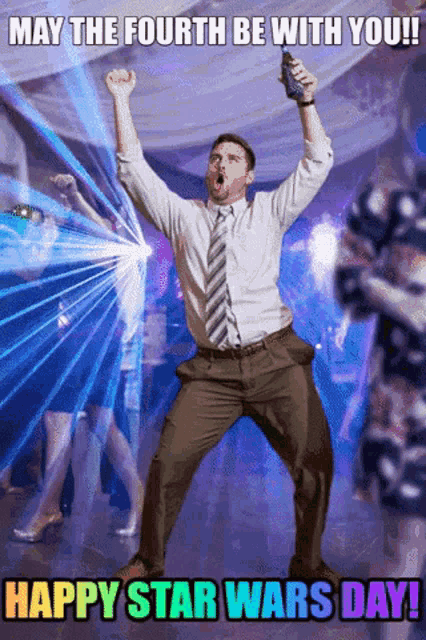 a man in a white shirt and tie is dancing in a room with the words may the fourth be with you happy star wars day below him