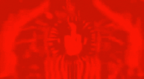 a red and black background with a blurred image