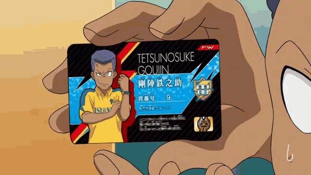 a person is holding a card that says tetsunosuke goujin on it